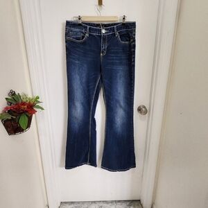 Seven7 high rise flare  manufactured  color distressed/fading plus size …